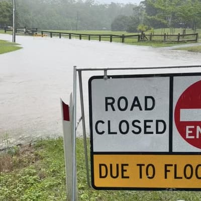 Woman killed, dozens of teens rescued in flood chaos