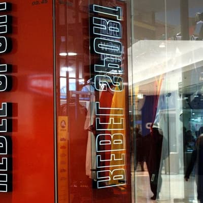 'Underpaid, overworked' managers sue Rebel Sports