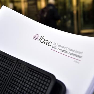 Duo fighting to hide corruption report could be named