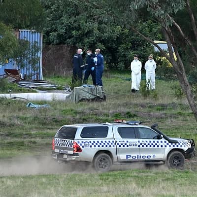 Two arrested as police probe Dezi Freeman's time on run