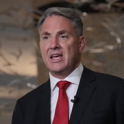 Australia digs at China's low-key showing at Asia forum