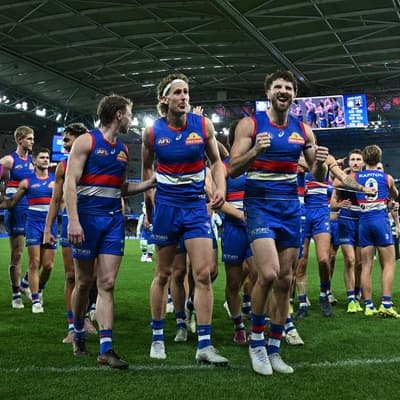 Dogged defender pips Pies with mark of a champion
