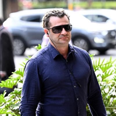 Reporter dragged into fraudster's widower 'shove' case