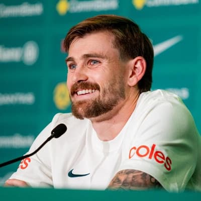 Socceroo still buzzing after sliding into history books