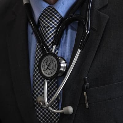Pediatrician accused of molesting 10 kids faces court