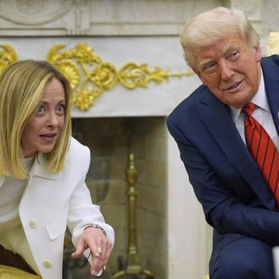 Italy's PM says Trump 'totally invented' photo story