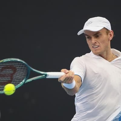 Hot stuff: Aussie ends Brit star's career at Wimbledon