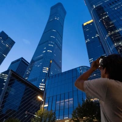 Small plane hits Beijing's tallest building: witnesses