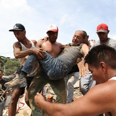 Death toll in Venezuela quakes tops 1400