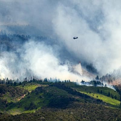 Three firefighters killed as fires rage in western US