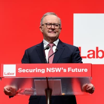 Right-wing rivals locked in 'race to the bottom': PM