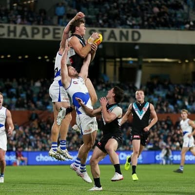 Concern for injured Kangaroo playmaker after Port loss