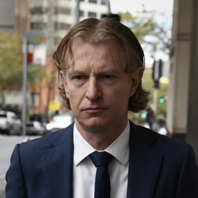 Government-linked advisor denies abusing three women