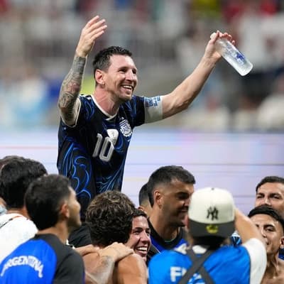Messi's men sink England, title defence one win away