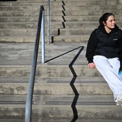 Dog days aren't over: Aussie gymnast's balancing act