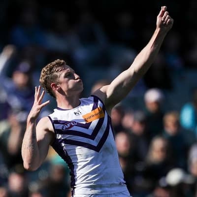 Flag fancies Fremantle overpower plucky Port Adelaide