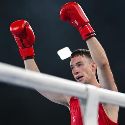 Tight win earns Australian boxing quarters berth