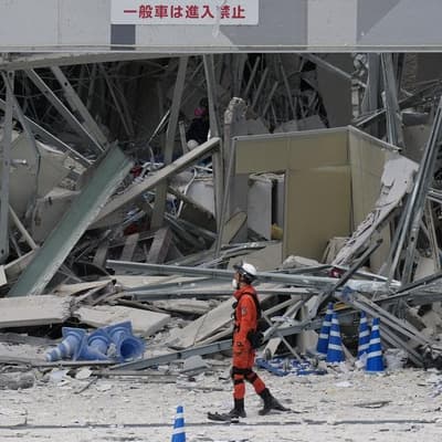 Survivors pulled from mall rubble as quake toll rises