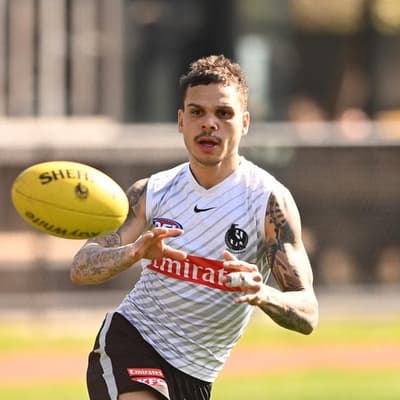 Magpies coach throws support behind Hill as star exits