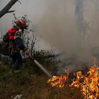 Greek fires rage as battle continues in France, Spain