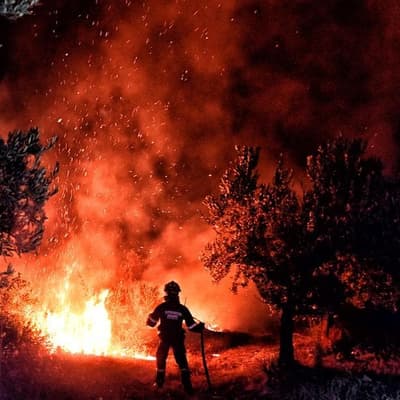 Fires spread in Greece, worsening in France, Spain