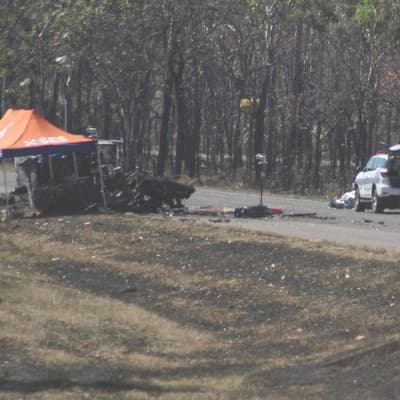 Horror highway inferno probe after rescuers forced back