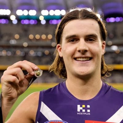 Pearce escapes injury but Fremantle sweat on Reid