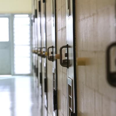 Private prison plan slammed as inmate numbers balloon