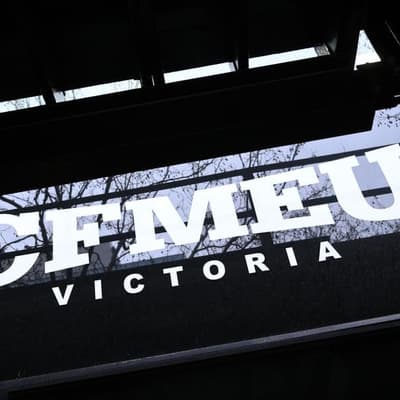 Two men charged after CFMEU headquarters, homes raided