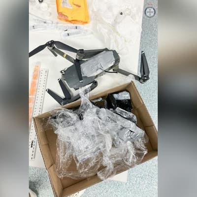 Man charged after drone drops drugs into big house