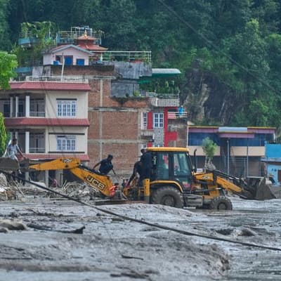 Fears for 'lovely' Australians missing in Nepal flood