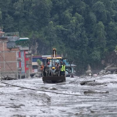 Aussie families cling to hope in Nepal flood search
