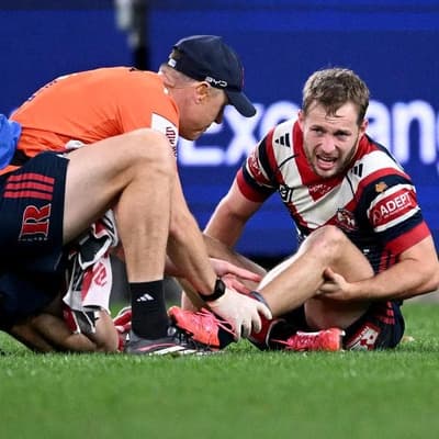 Roosters cop huge title blow as Walker set for surgery