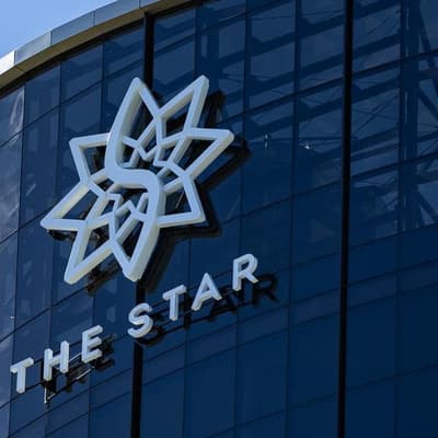 Chips still down at casino group as loss narrows