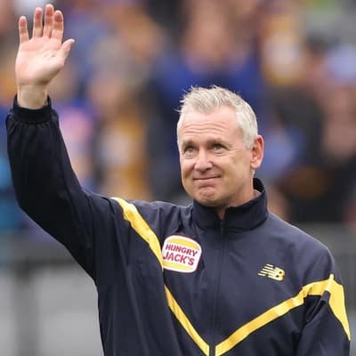 AFL flag coach to 'have a good think' about North job