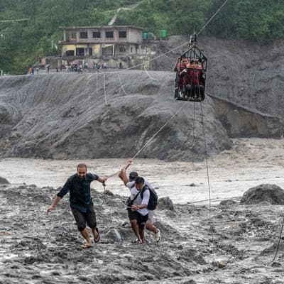 Nepal survivors' fresh test as men pulled from tunnel