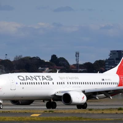 'Traumatic': Qantas plane diverted after mid-air flames