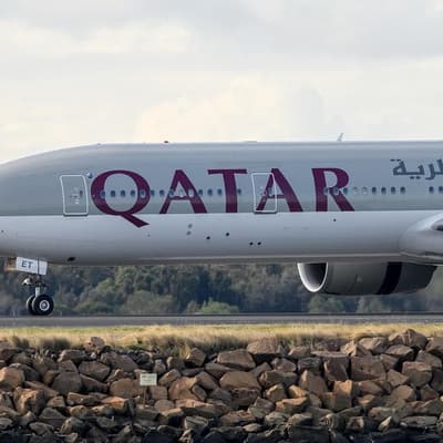 Two men detained after altercation on flight to Doha