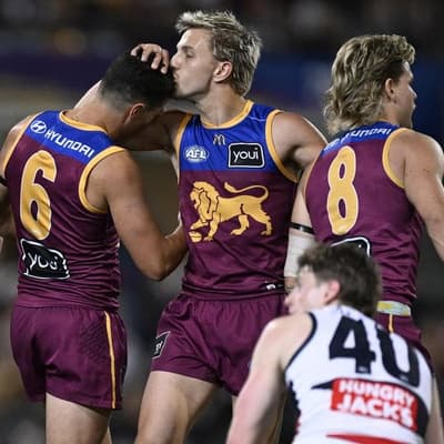 Old-fashioned spray sparks life into AFL three-peat