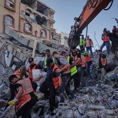 Bombed-out Gaza building collapses, killing 20 people
