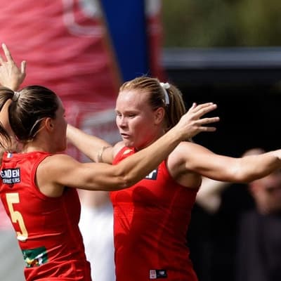 Suns surge to victory, Tigers survive Giant AFLW scare