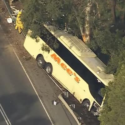 One dead, scores injured in bus crash on rural highway