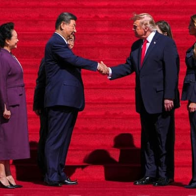 Trump, Xi wrap up summit with tea and US archives tour