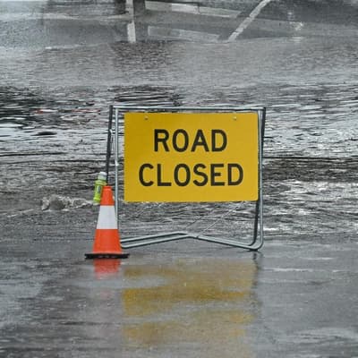 Warnings issued as rivers rise amid heavy falls