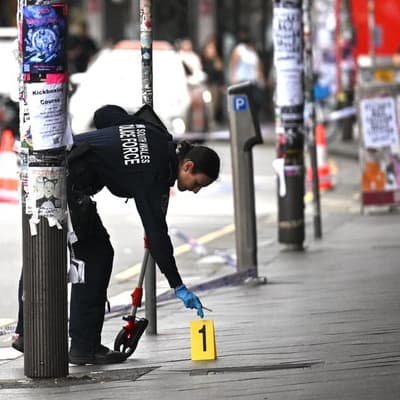 Woman charged over alleged random stabbing of man