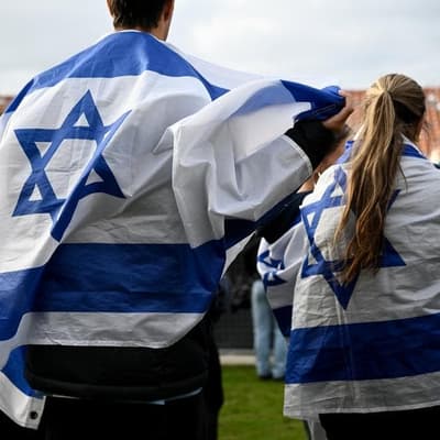 Sombre vigils mark October 7 attack amid heavy security