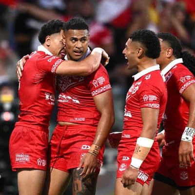 Tonga crush England in World Cup game of death