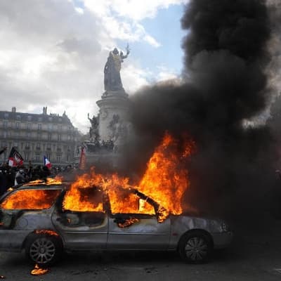France imposes curfews after riots and looting