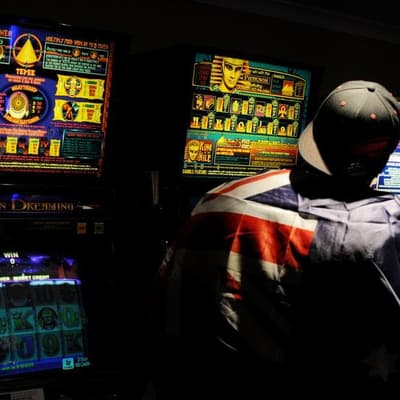 'Reverse ATMs': pokies panned for harm as reforms urged