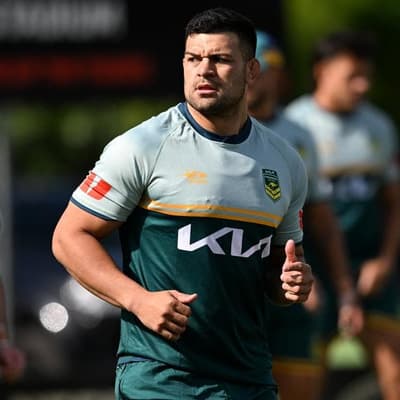 Rabbitoh beats 'hard times' to make Australia debut